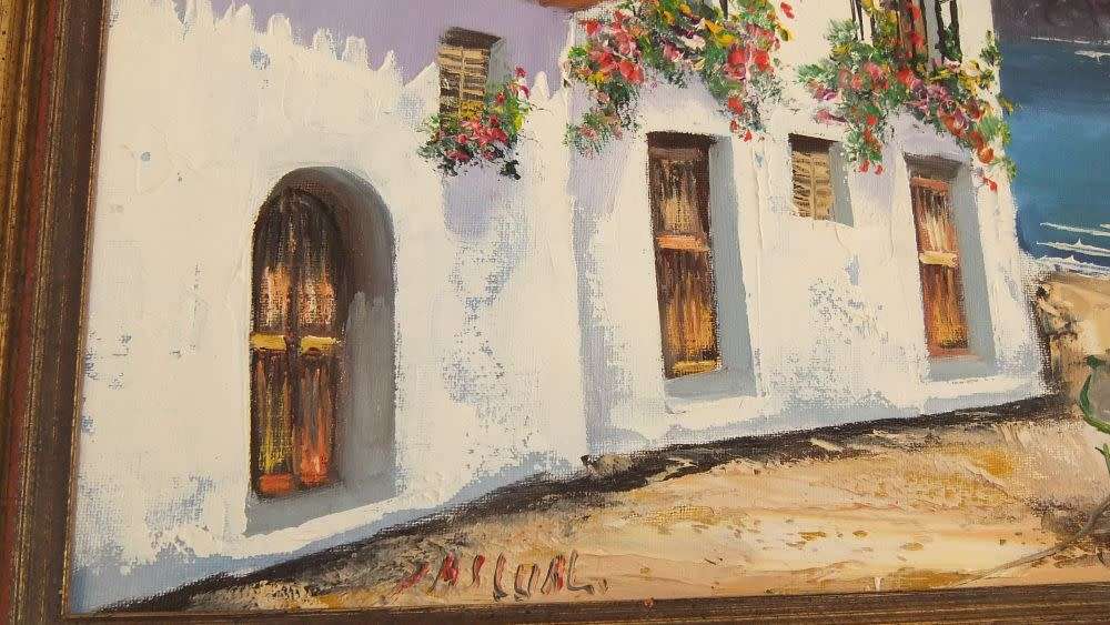 An original signed oil on board Spanish coastal village painting by Spanish artist Juan Pascual