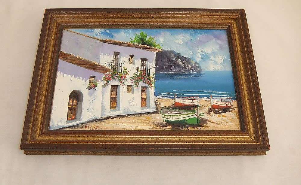 An original signed oil on board Spanish coastal village painting by Spanish artist Juan Pascual