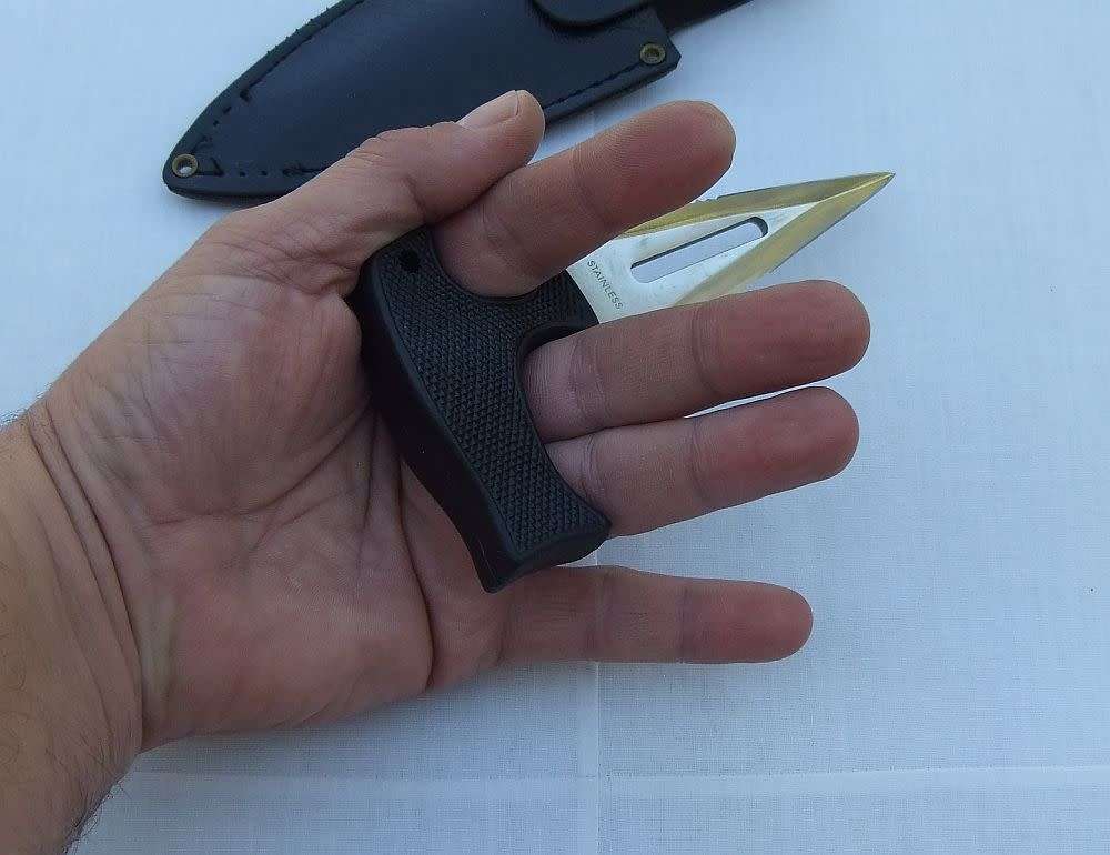 A totally cool D.O.W fist or push dagger - sharp - with sheath / pouch - hardly used