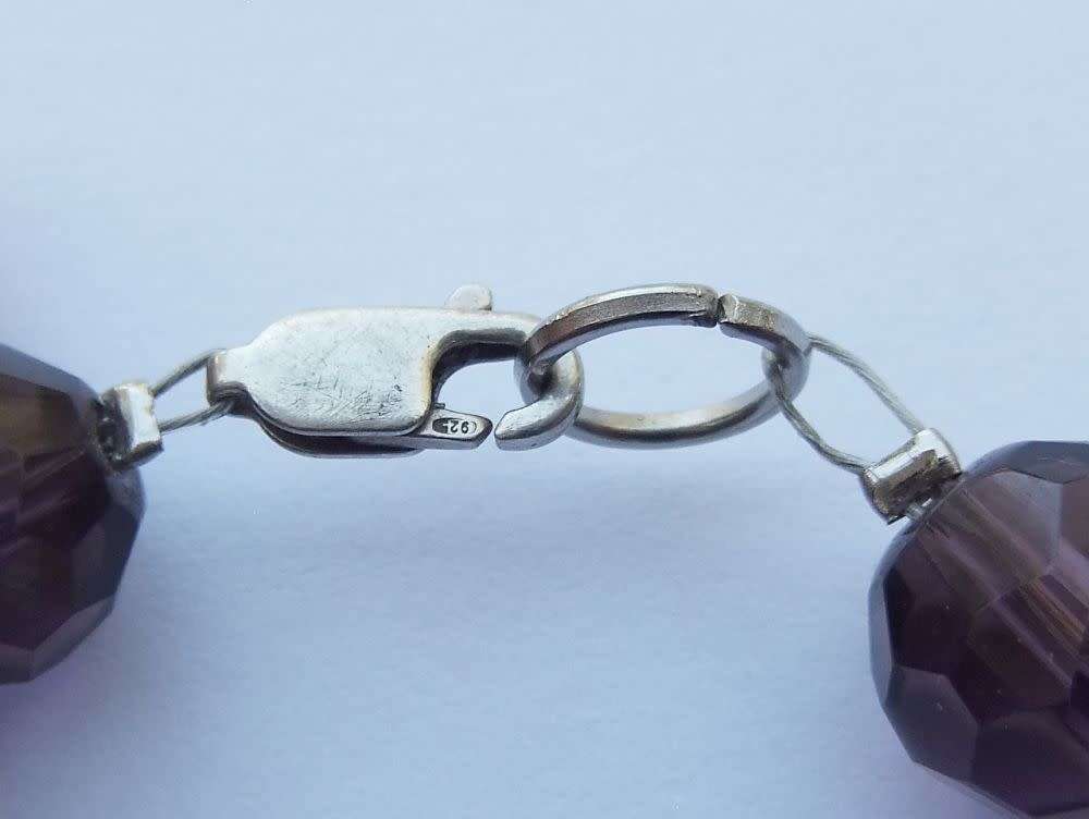 An eye catching handmade genuine freshwater Pearl and glass bracelet with sterling silver clasp