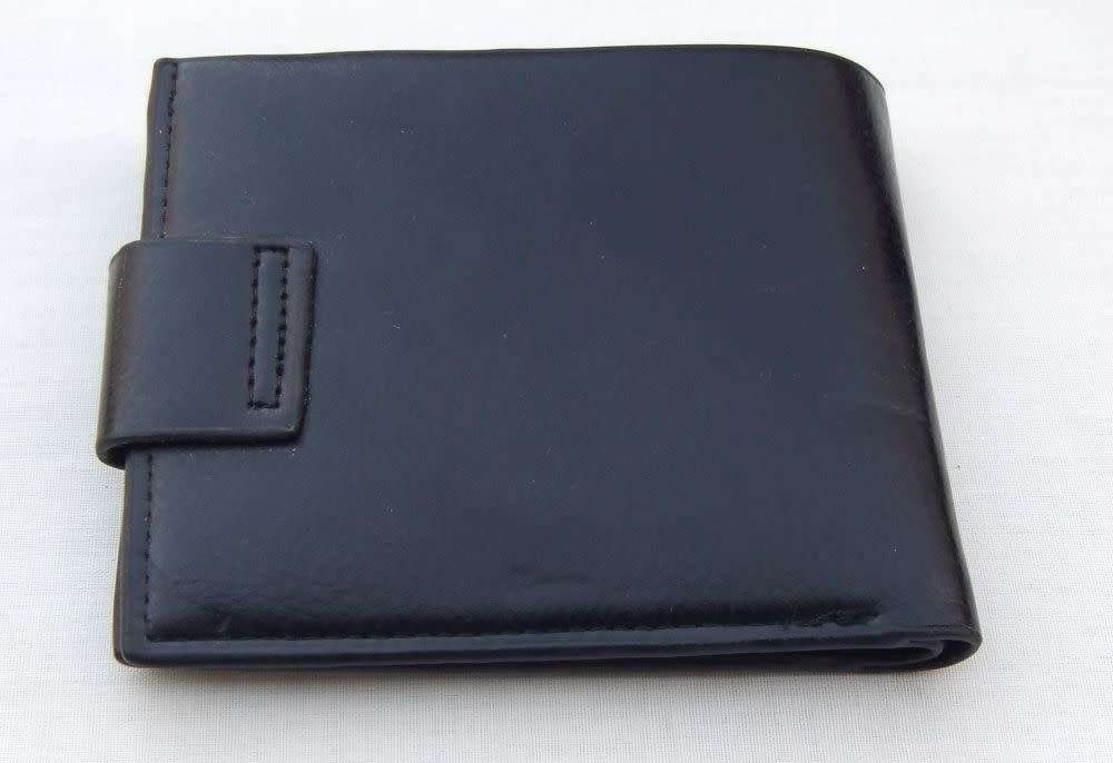 Brand new !! A PU leather unisex wallet / purse for notes , coins and cards with magnetic clip