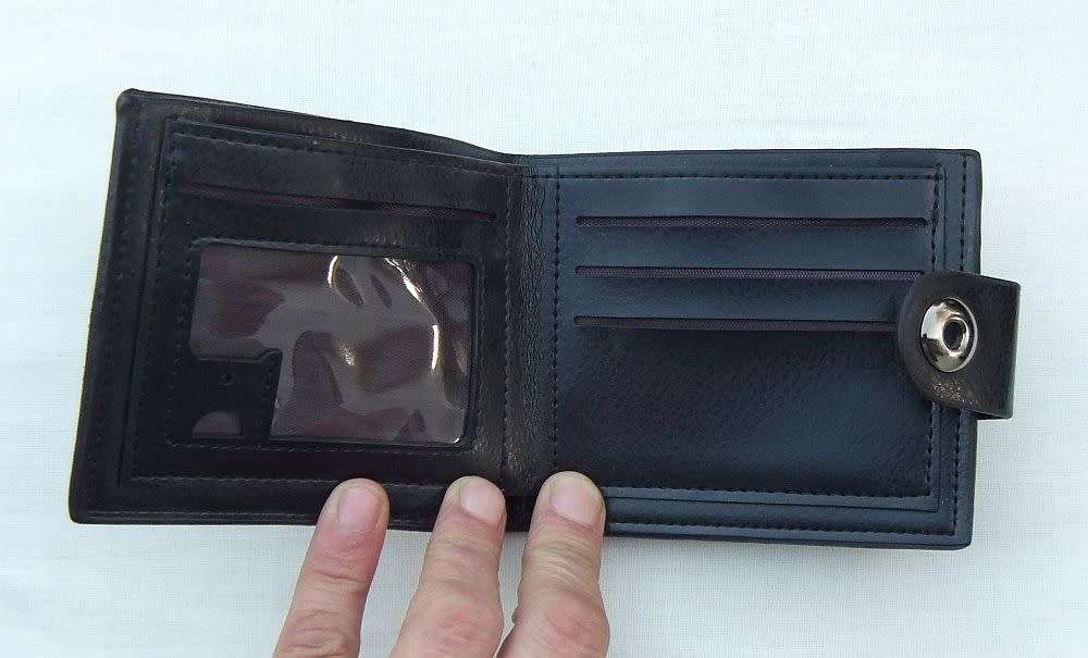 Brand new !! A PU leather unisex wallet / purse for notes , coins and cards with magnetic clip