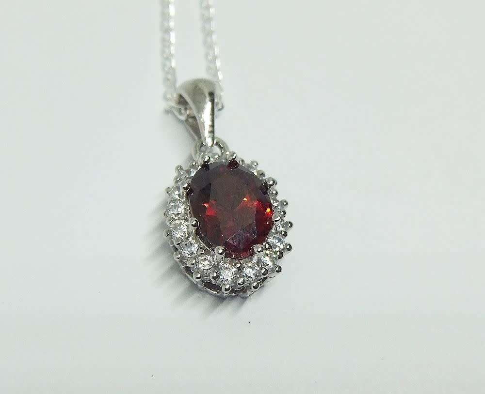 AN ELEGANT FACETED RED AND CLEAR CZ SET STERLING SILVER PENDANT WITH STERLING SILVER NECKLACE