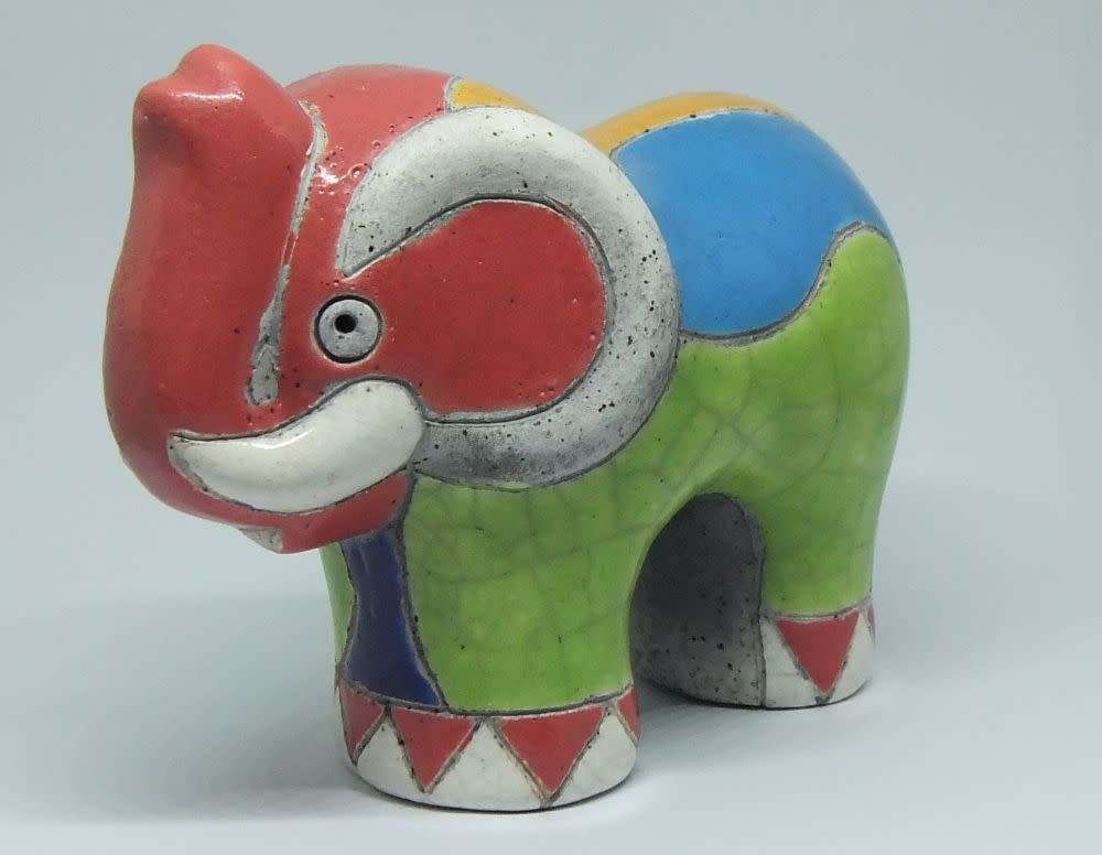 A COLOURFUL SIGNED VINTAGE RAKU POTTERY ELEPHANT FIGURINE
