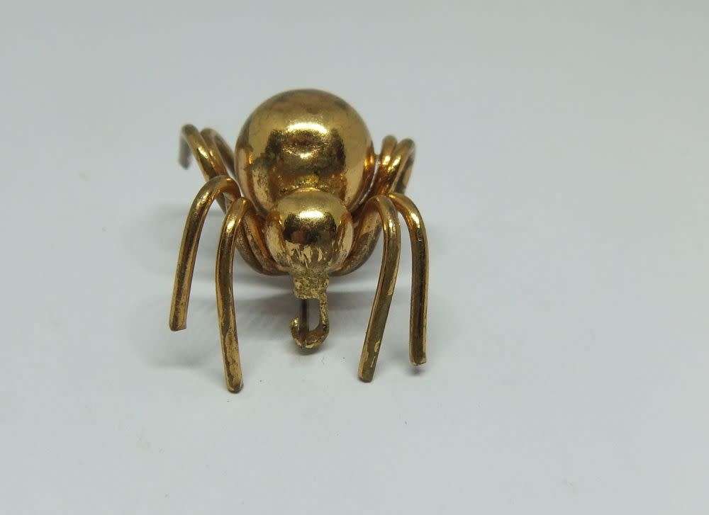 R50 SALE !! A VINTAGE GOLD TONE SPIDER BROOCH