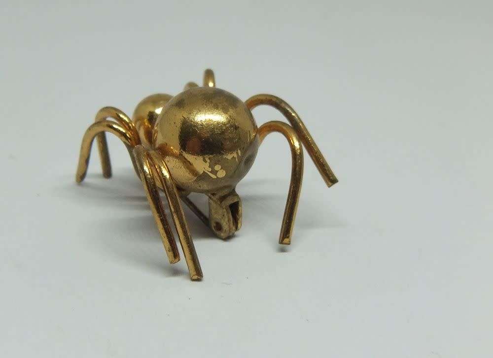 R50 SALE !! A VINTAGE GOLD TONE SPIDER BROOCH