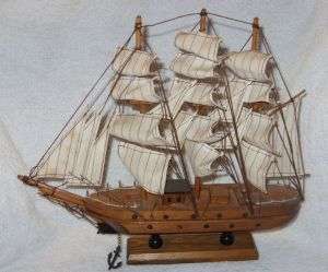 GREAT SHOW PIECE - WOODEN BOAT WITH MATERIAL SAILS