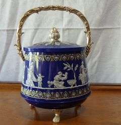 A gorgeous tin cookie jar - Wedgwood style