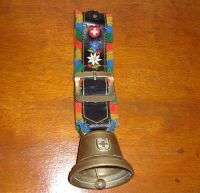 A Swiss solid brass bell on a " belt " - very loud and very clear - Swiss quality