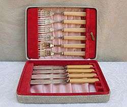 A very old lot of cutlery in its original box - bone or ivory handles ?