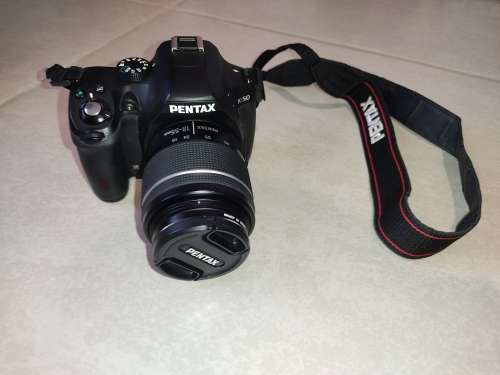 Pentax K-50 SLR Camera + Lens & Accessories - (Needs repairs aperture is jammed)