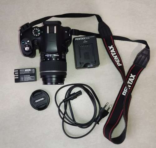 Pentax K-50 SLR Camera + Lens & Accessories - (Needs repairs aperture is jammed)