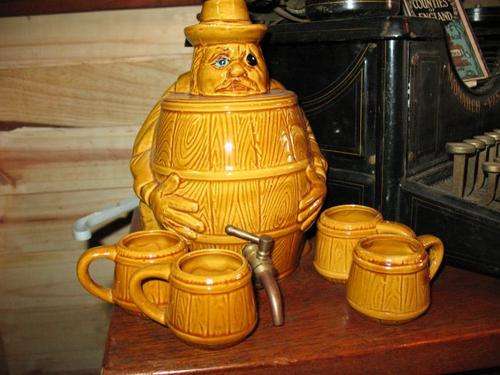 JUG WITH 4 OLD SHOOTER GLASSES