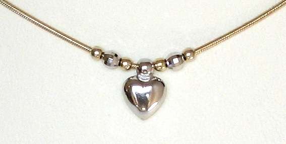 Heart Bracelet: 9ct yellow & white gold