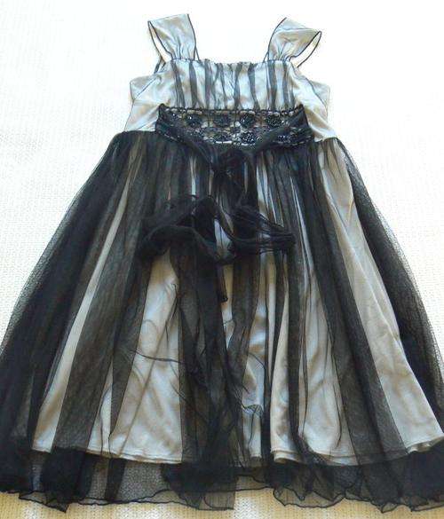 Lovely girl's evening or party dress with black net and beading detail, size 12