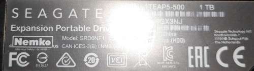 Seagate 1TB - Expansion Super Slim Portable Drive `Like New` with cable and New Protection Sleeve.