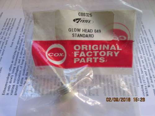 ORIGINAL NEW COX GLOW PLUG 049..USED ON BABY BEE ENGINE