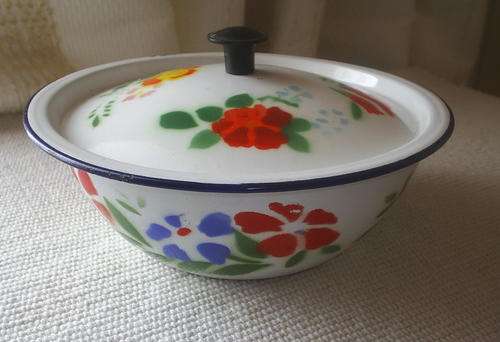 A Very Old and Used Enamel Bowl with Lid
