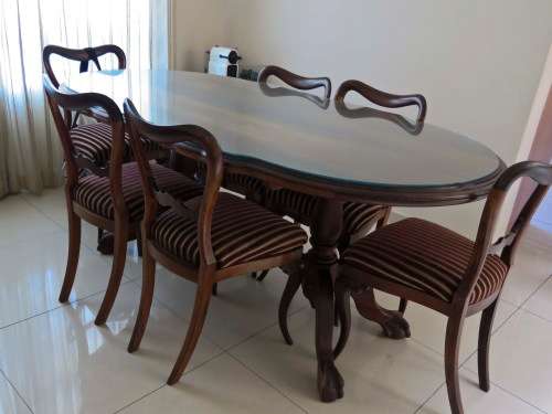 Imbuia 6 seater Dining Table with Glass top. Excludes the chairs