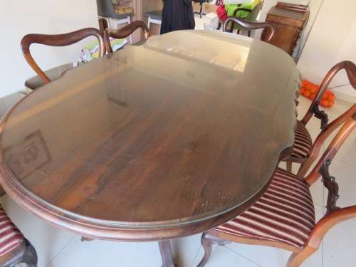 Imbuia 6 seater Dining Table with Glass top. Excludes the chairs