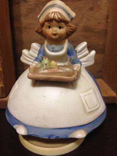MUSICAL Turning 1979 porcelain wind up musical turning Albert E Price ornament