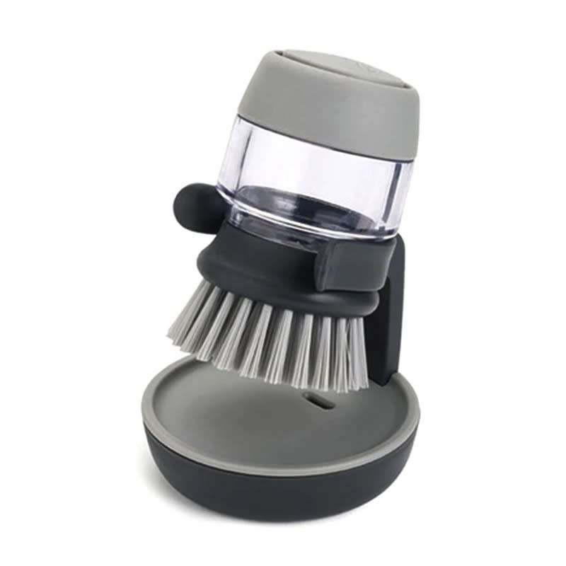 Soap dispenser palm brush with storage stand
