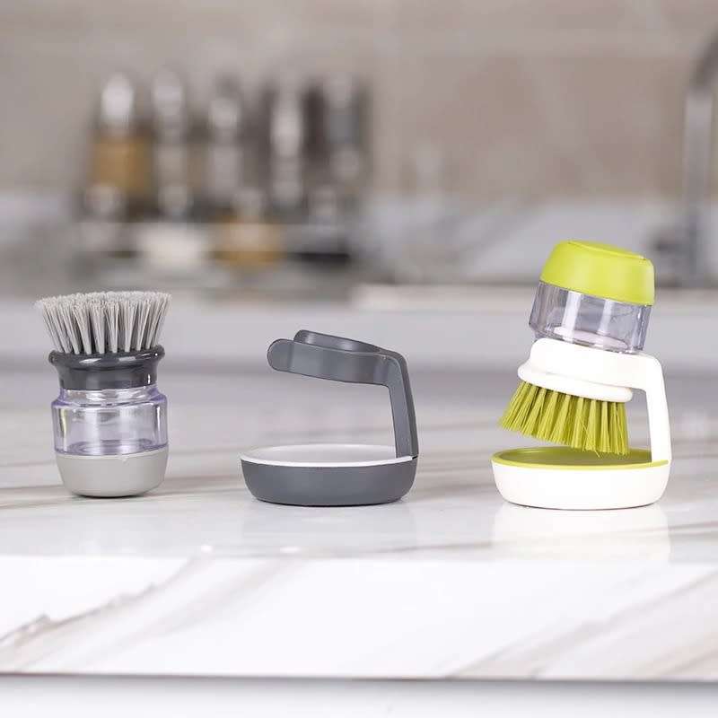 Soap dispenser palm brush with storage stand