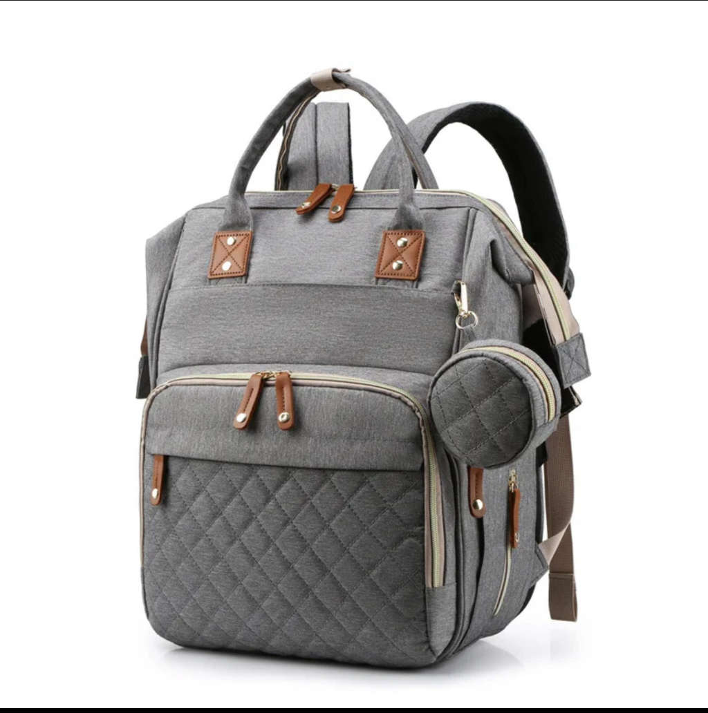 Multi-functional baby diaper bag & Bed