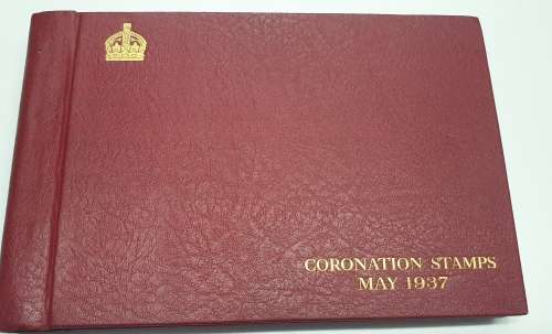 1937 Coronation stamp album + stamps.