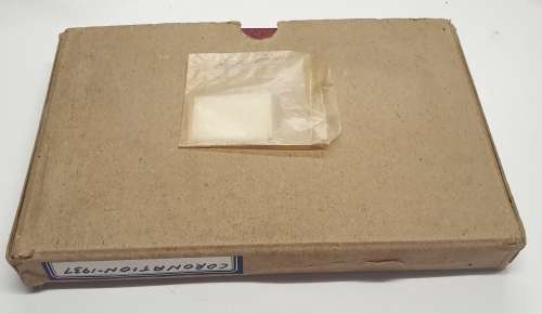 1937 Coronation stamp album + stamps.