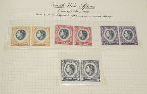 1937 Coronation stamp album + stamps.