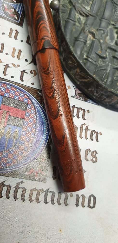 WATERMAN`S IDEAL NO52 RED RIPPLE FOUNTAIN PEN.14CT GOLD NIB