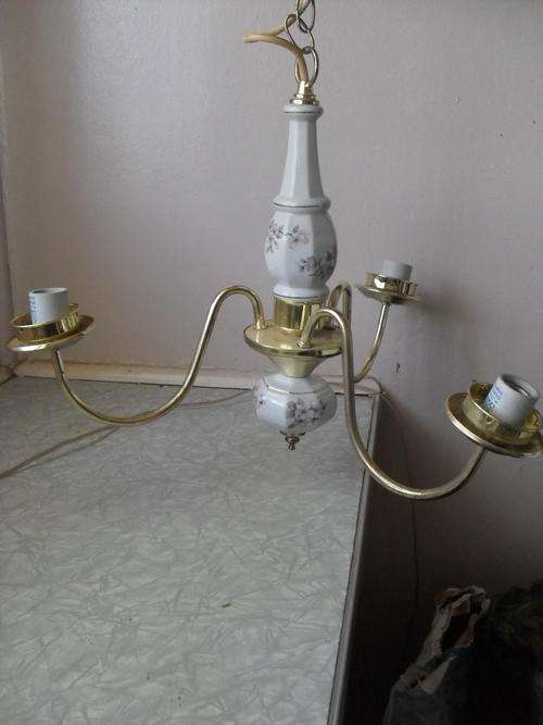 STUNNING 3 TEAR PORCELAIN AND BRASS CHANDELIER.