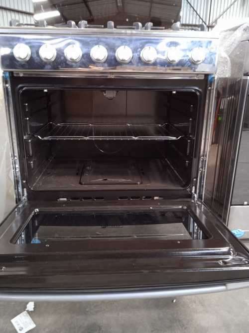 6 BURNER STAINLESS STEEL GAS STOVE WITH GAS OVEN AND FFD - SHOP SOILED - NOT BOXED