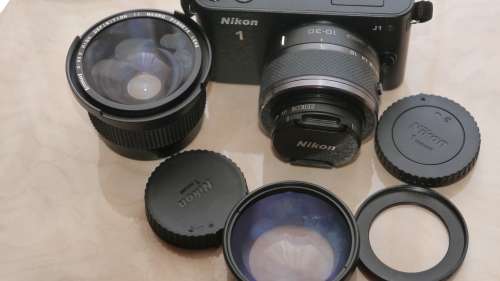 Nikon 1 J1 Mirrorless Digital Camera with 10-30mm VR Zoom Lens¿