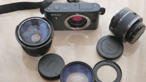 Nikon 1 J1 Mirrorless Digital Camera with 10-30mm VR Zoom Lens¿