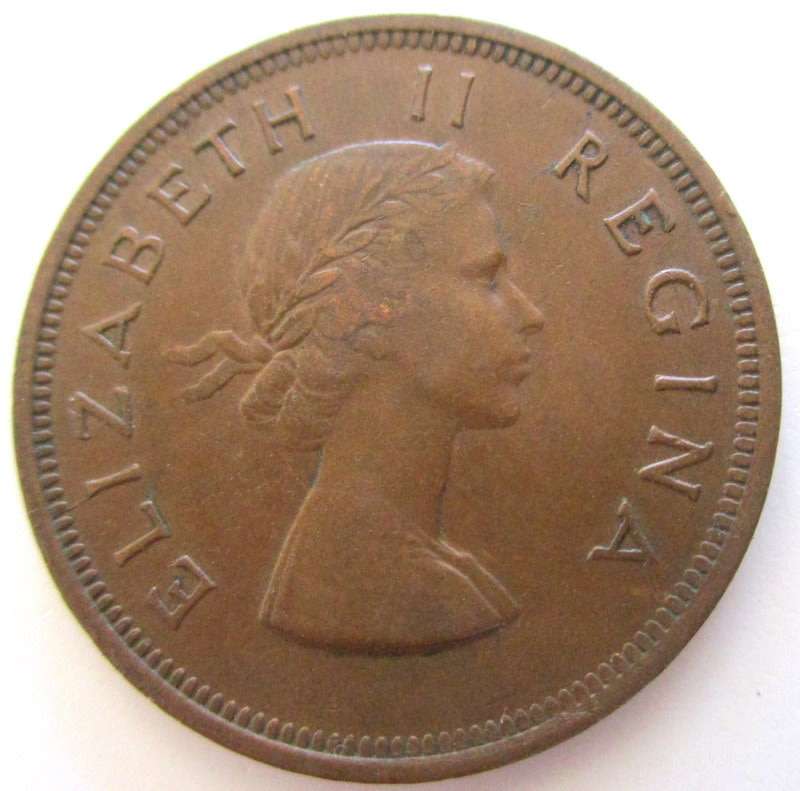 A 1954 SOUTH AFRICA PENNY---Very good detail but has a curl on the rim