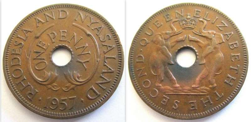 A LOT OF RHODESIAN AND SOUTHERN RHOD COINS INCLUDING A 1954 SOUTHERN RHOD HALF CROWN --ALL FOR 1 bid