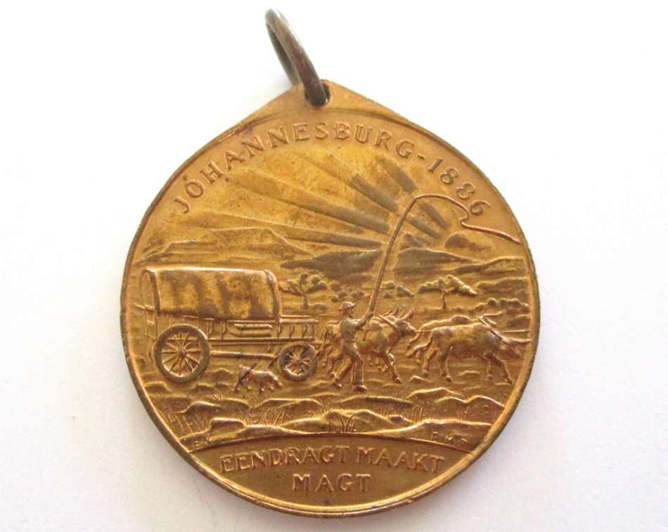 A LOT OF COMMEMORATIVE COINS AND MEDALLIONS AND A SPOON MADE FROM A 1942 COIN