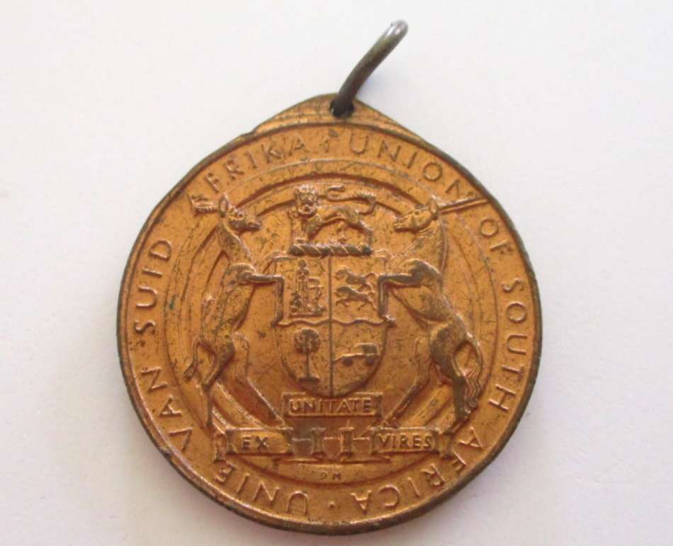 A LOT OF COMMEMORATIVE COINS AND MEDALLIONS AND A SPOON MADE FROM A 1942 COIN