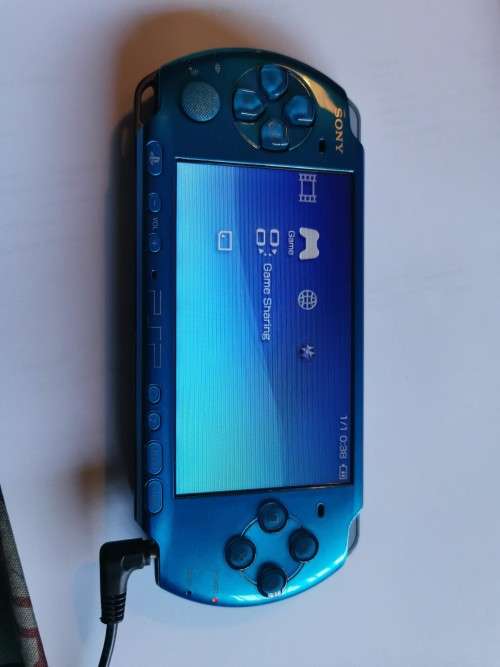 PSP 3000 - vibrant blue  version 6.6- excellent condition