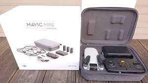 AS  NEW IN BOX*DJI MAVIC MINI*FLYMORE COMBO DRONE * ALL   ACCESSORIES * 3 BATTERIES * BARGAIN