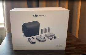 AS  NEW IN BOX*DJI MAVIC MINI*FLYMORE COMBO DRONE * ALL   ACCESSORIES * 3 BATTERIES * BARGAIN