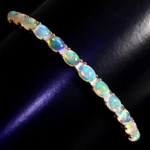 "IN STOCK" Oval Cab 7x5mm Rainbow Full Flash Fire Opal 925 Sterling Silver Bangle