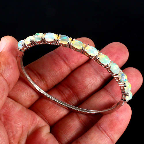 "IN STOCK" Oval Cab 7x5mm Rainbow Full Flash Fire Opal 925 Sterling Silver Bangle