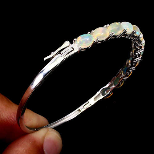 "IN STOCK" Oval Cab 7x5mm Rainbow Full Flash Fire Opal 925 Sterling Silver Bangle