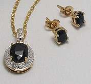 **R4 660**  Real sapphire and 925 sterling silver set plated with 14ct yellow gold