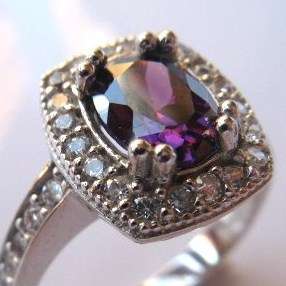 **R1 599** Amethyst and Topaz solid sterling silver ring
