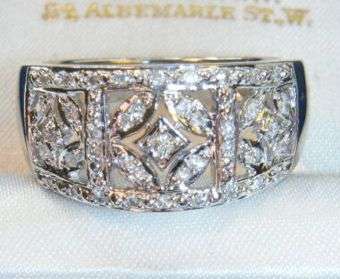 9CT WHITE GOLD .25 CARAT DIAMOND BAND RING M