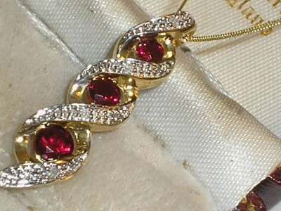 9ct gold real ruby & diamond pendant & 18" chain